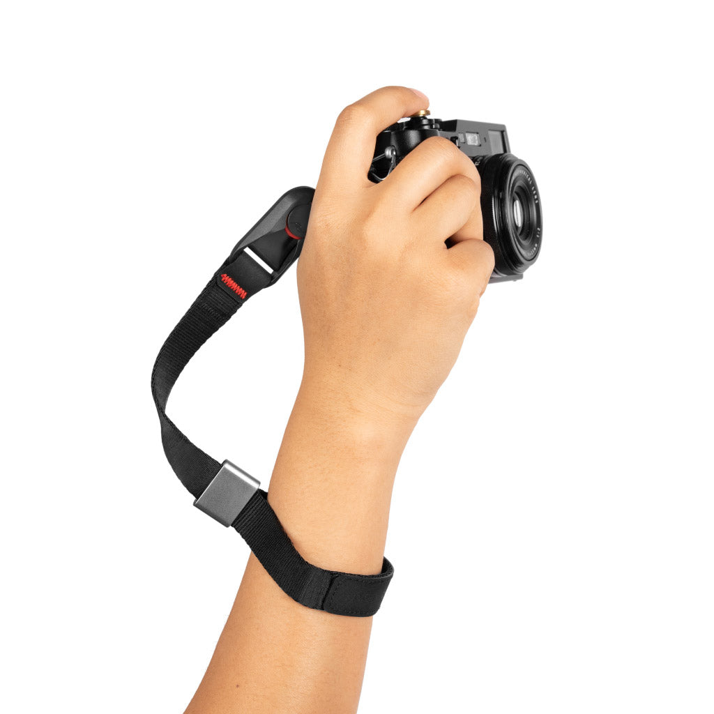 Black cuff fits on the wrist with the aluminum adjuster